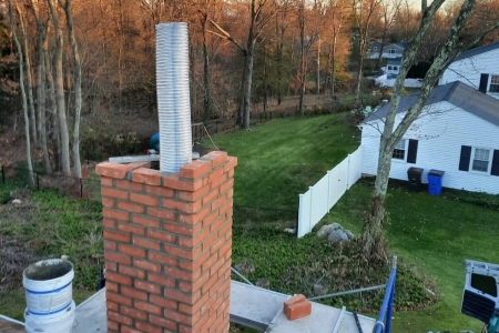 Chimney Rebuild to Original Specs With New Bricks